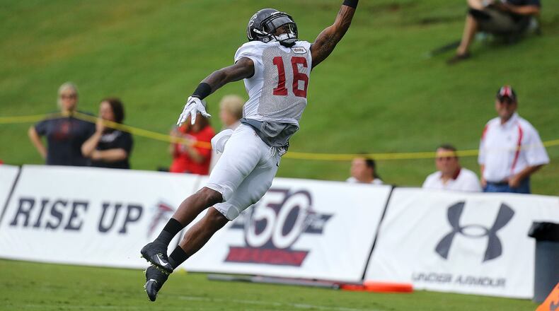 Falcons rookie wide receiver Justin Hardy makes a leaping one-handed catch during a team practice. Curtis Compton / ccompton@ajc.com