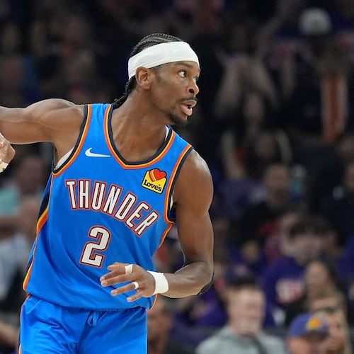 Oklahoma City Thunder guard Shai Gilgeous-Alexander celebrates a 3-pointer against the Phoenix Suns during the first half of Game 3 of a first-round NBA playoffs basketball series, Saturday, April 25, 2026, in Phoenix. (AP Photo/Ross D. Franklin)