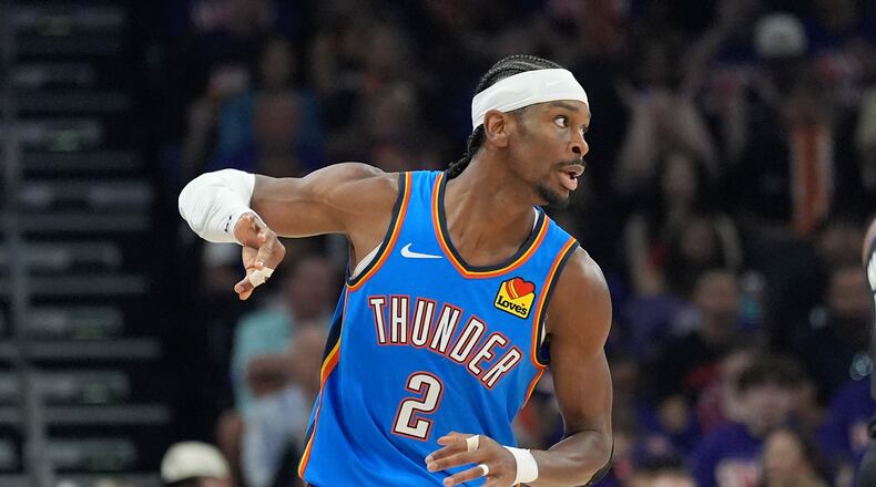 Oklahoma City Thunder guard Shai Gilgeous-Alexander celebrates a 3-pointer against the Phoenix Suns during the first half of Game 3 of a first-round NBA playoffs basketball series, Saturday, April 25, 2026, in Phoenix. (AP Photo/Ross D. Franklin)