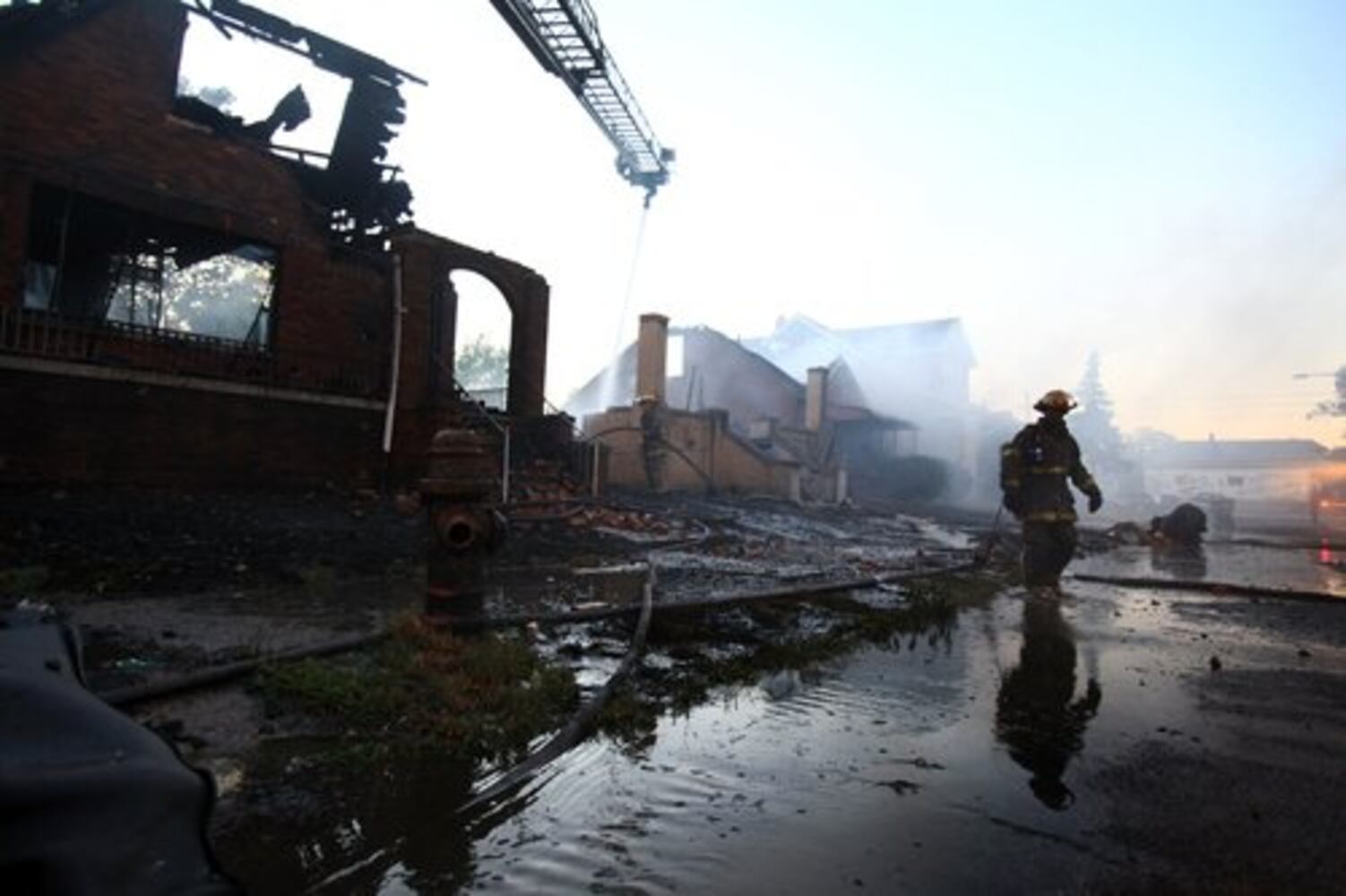 Winds push fires through dozens of Detroit homes