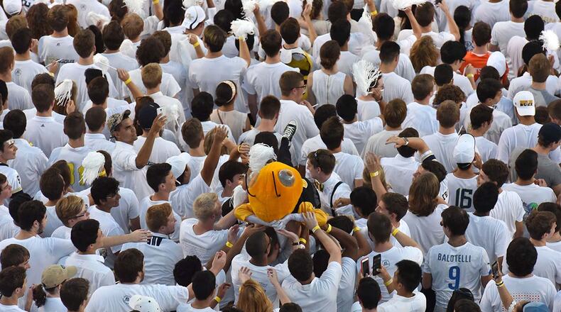 September 22, 2016 Atlanta - Georgia Tech Buzz and fans cheer before their game against the Clemson Tigers at Bobby Dodd Stadium on Thursday, September 22, 2016. HYOSUB SHIN / HSHIN@AJC.COM