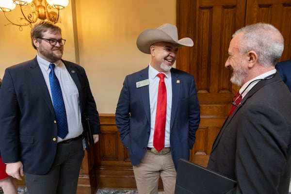 State Rep. Jason Ridley, R-Chatsworth, (center) and Rep. Matt Barton, R-Calhoun, (right) seen here at the state Capitol in 2024. (Arvin Temkar/ajc)