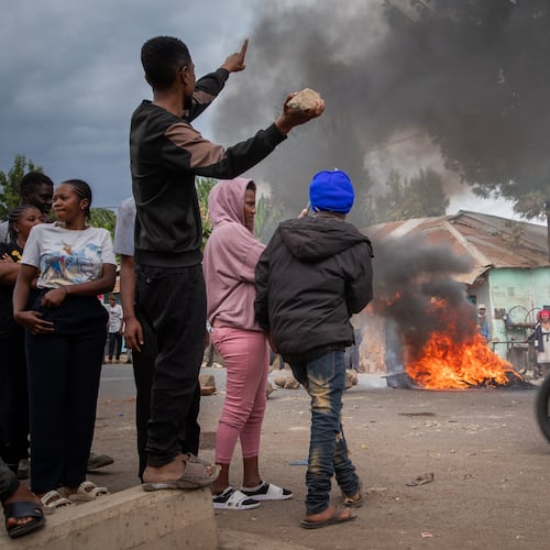 People protest in the streets of Arusha, Tanzania, on election day Wednesday, Oct. 29, 2025. (AP Photo)