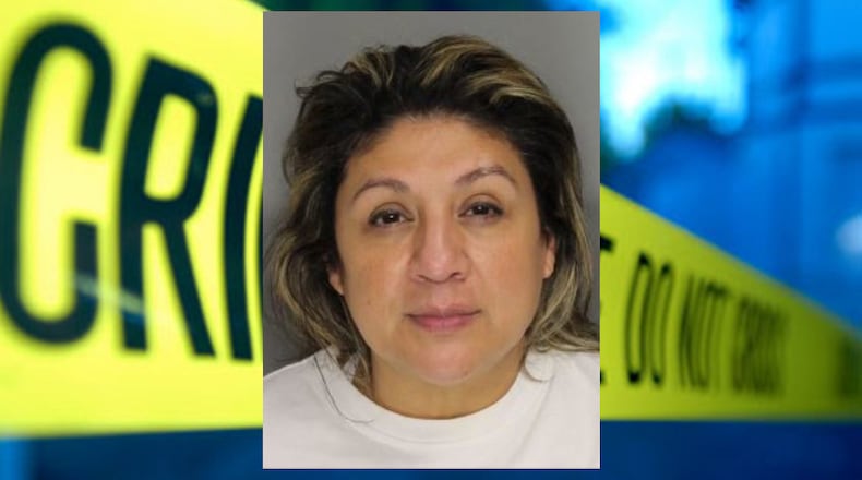 Diana Mirtala Mitchell was arrested Sunday and charged with theft by taking and three counts of identity theft, all felonies.