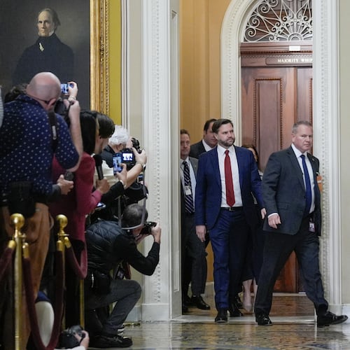 Vice President JD Vance, center, arrives for a Senate Republican Conference luncheon at the U.S. Capitol on day 28 of the government shutdown, Tuesday, Oct. 28, 2025, in Washington. (AP Photo/Mariam Zuhaib)