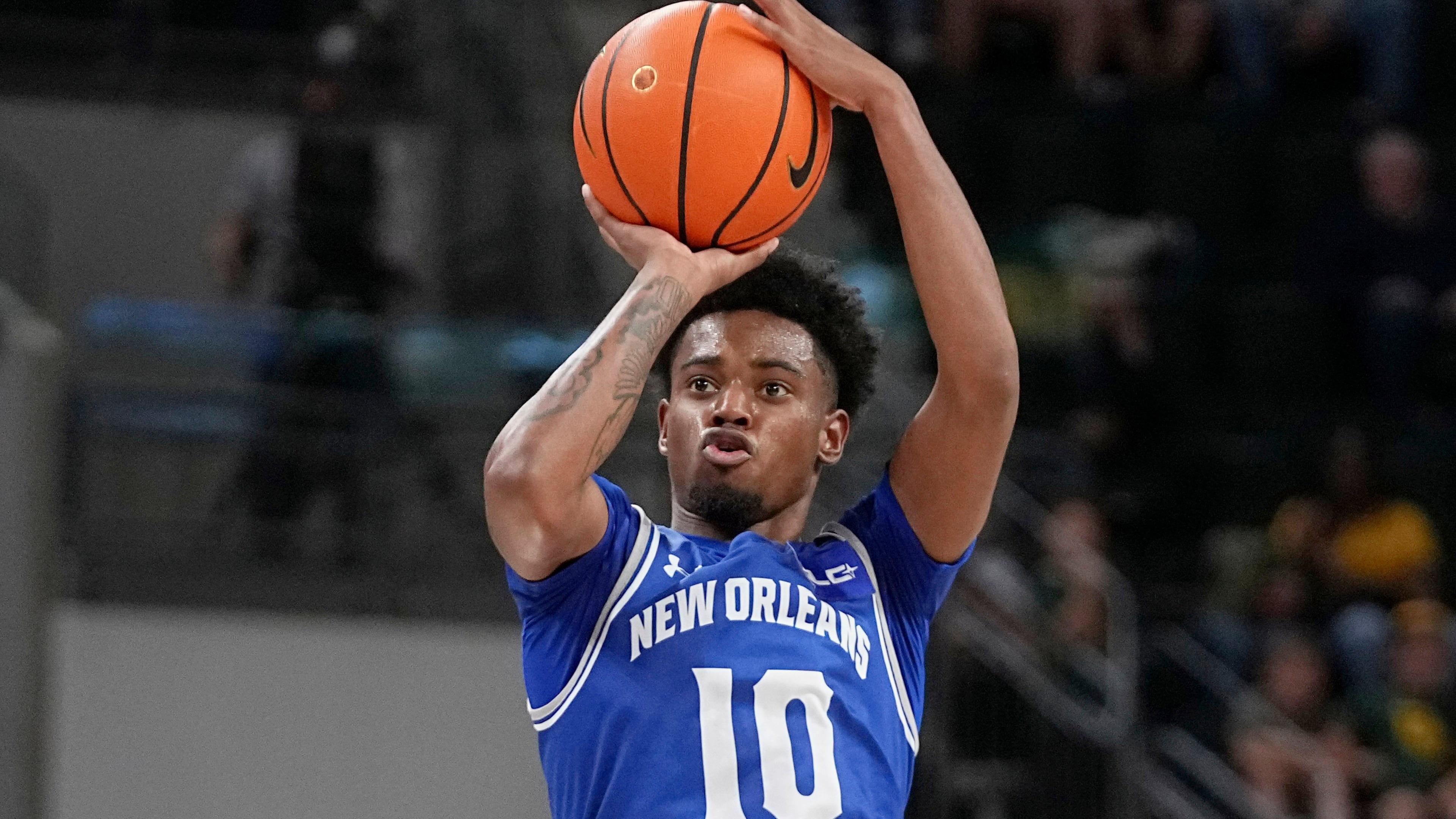 FILE - New Orleans guard Dae Dae Hunter shoots and sinks a 3-point basket in the second half of an NCAA college basketball game against Baylor, Nov. 27, 2024, in Waco, Texas. (AP Photo/Tony Gutierrez)