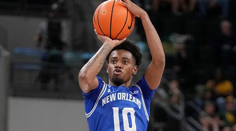 FILE - New Orleans guard Dae Dae Hunter shoots and sinks a 3-point basket in the second half of an NCAA college basketball game against Baylor, Nov. 27, 2024, in Waco, Texas. (AP Photo/Tony Gutierrez)