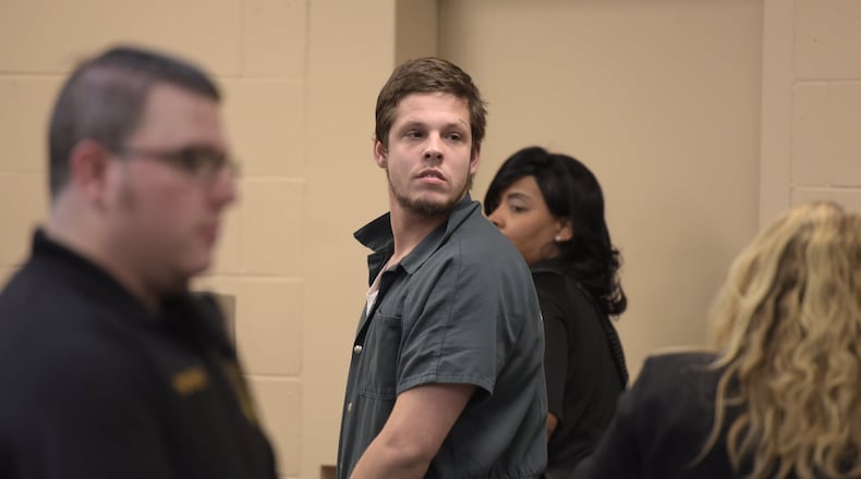 Jacob Kosky of McDonough is lead out of the courtroom in McDonough last November. Kosky was indicted Tuesday for shooting and killing four people at a house in Henry County Oct. 26. (DAVID BARNES / DAVID.BARNES@AJC.COM)