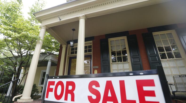 Home prices continue to climb in most metro Atlanta neighborhoods. (AP Photo/Steve Helber)