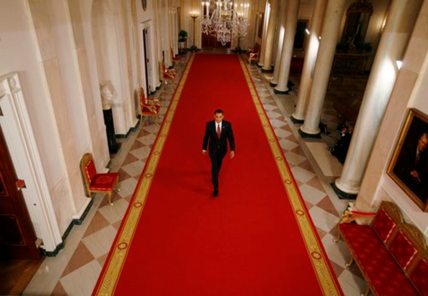 Obama defends plans for economic recovery