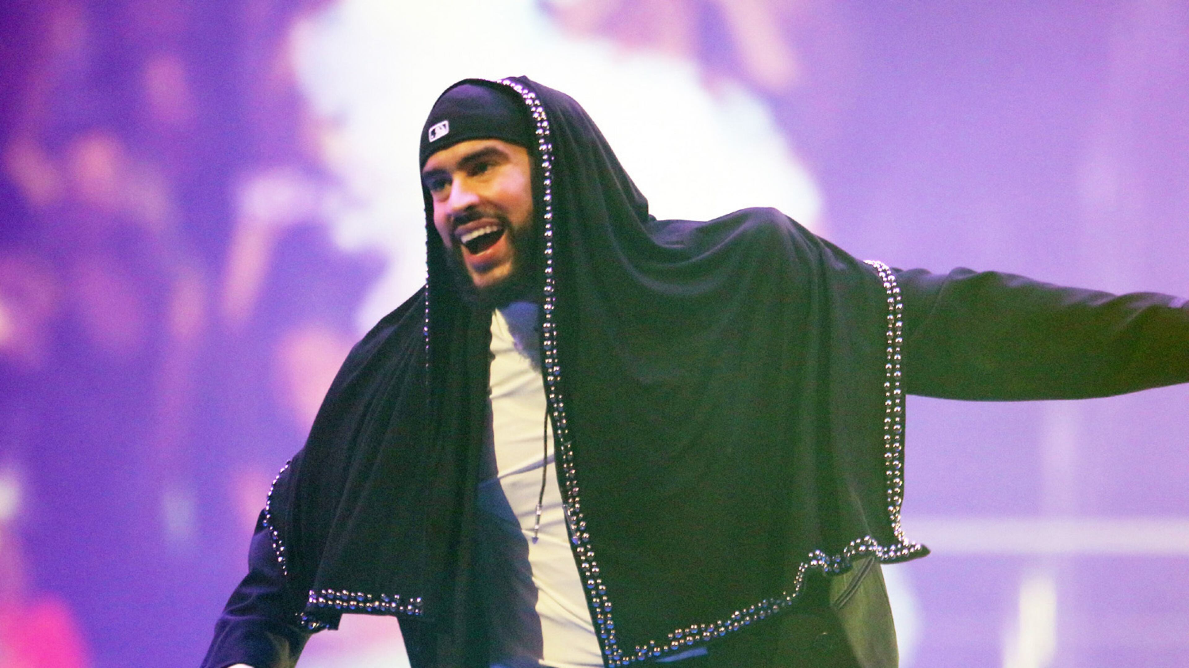 Courses centered around Puerto Rican superstar Bad Bunny, shown here rocking a sold out State Farm Arena last year, are beginning to spring up on college campuses across the U.S. (Robb Cohen for the AJC 2024)