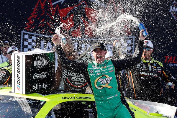 NASCAR Cup Series driver Austin Cindric celebrates after winning a NASCAR Cup Series auto race at Talladega Superspeedway, Sunday, April 27, 2025, in Talladega, Ala. (AP Photo/Butch Dill)