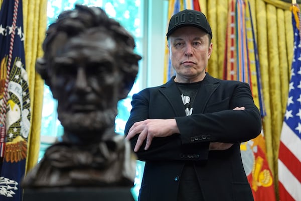 FILE - Elon Musk listens as President Donald Trump speaks during a news conference in the Oval Office of the White House, May 30, 2025, in Washington. (AP Photo/Evan Vucci, File)