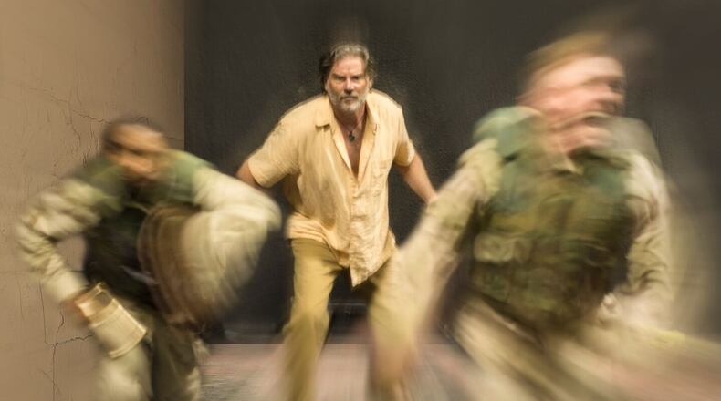 Kevin Stillwell (center) appears in the 7 Stages production of “Bengal Tiger at the Baghdad Zoo.” CONTRIBUTED BY STUNGUN PHOTOGRAPHY