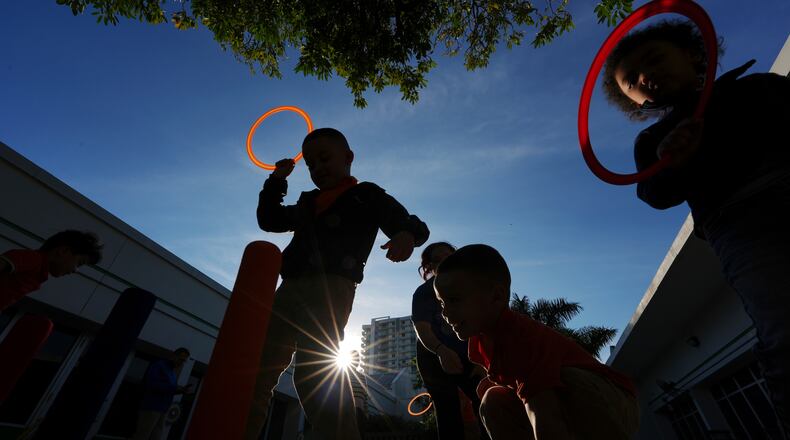 FILE - Children play during aftercare for the Head Start program at Easterseals South Florida, Jan. 29, 2025, in Miami. (AP Photo/Rebecca Blackwell, File)