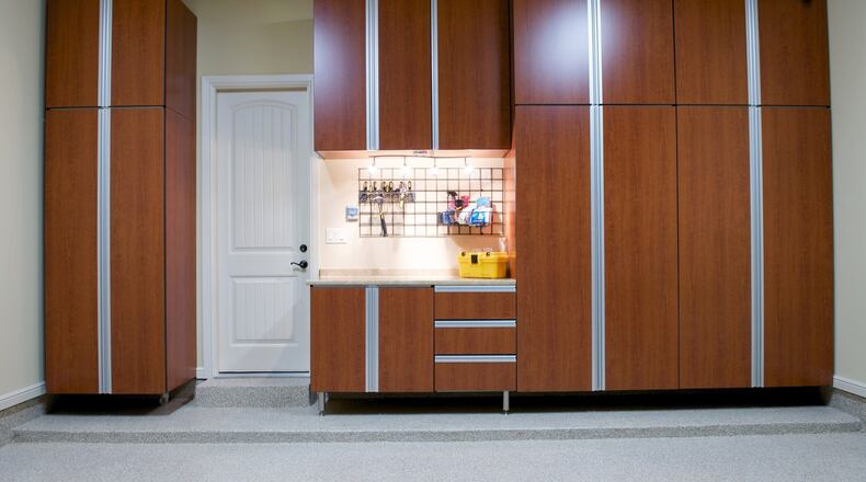 Creative storage options put an organized garage within reach. (Dreamstime)