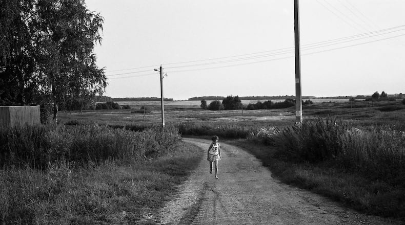 Elena Nikitina’s “Careless Days” is featured in the Atlanta Photography Group’s “Portfolio 2017.”