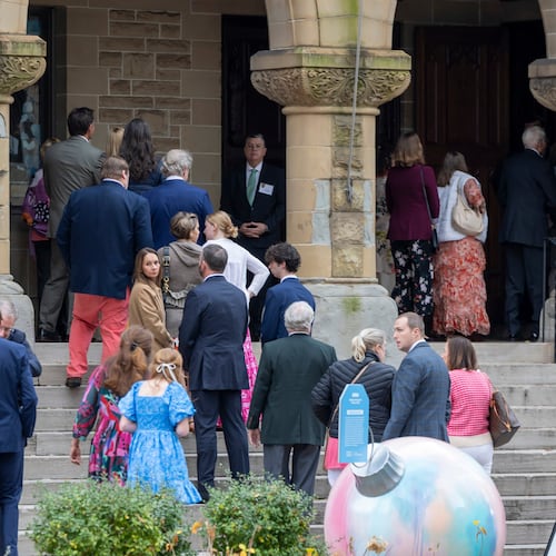 People arrive for a funeral service for Brown University shooting victim Ella Cook, Monday, Dec. 22, 2025, in Birmingham, Ala. (AP Photo/Vasha Hunt)