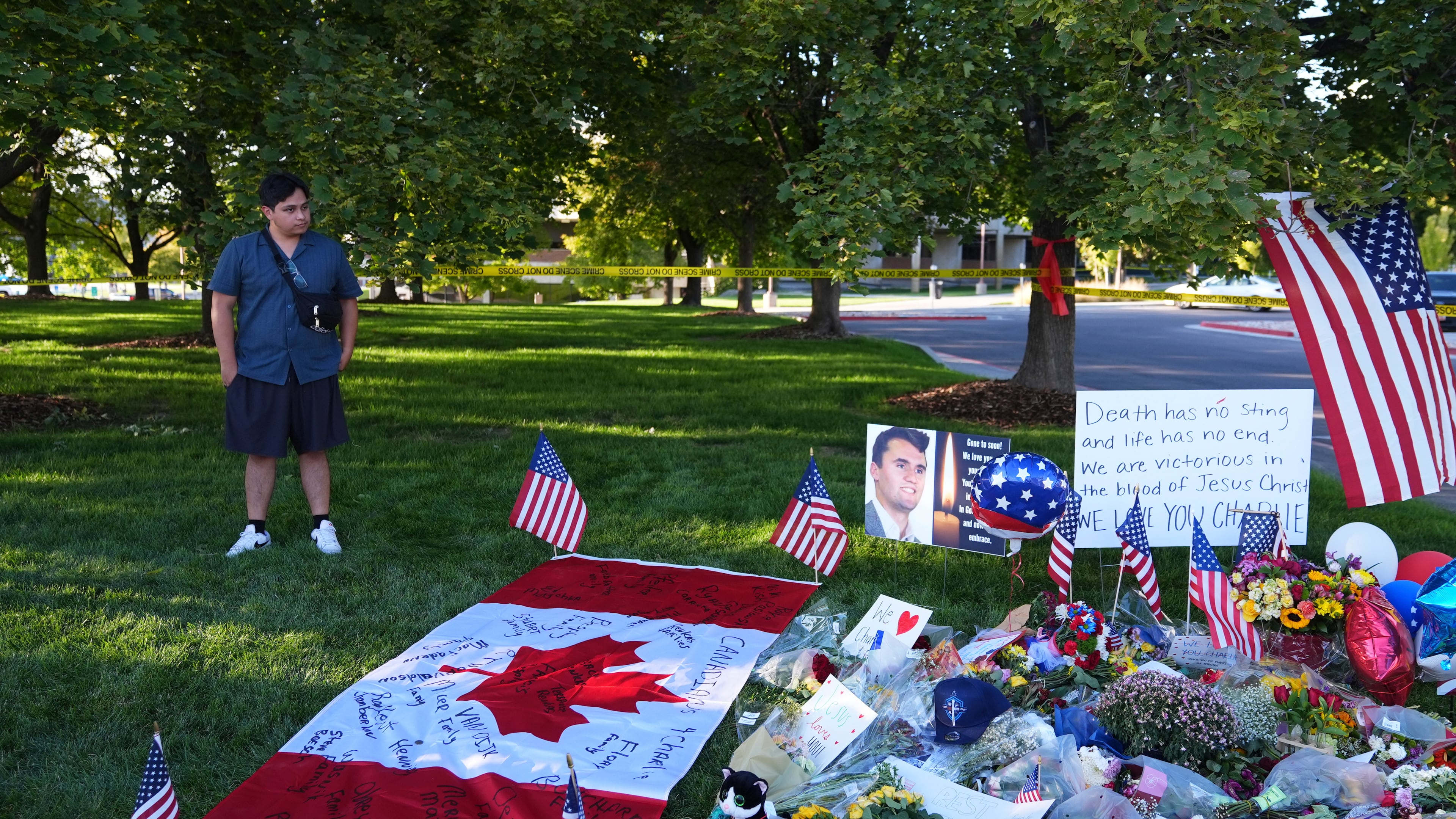 Utah Valley University student Alec Vera stands near a memorial for Charlie Kirk on Friday, Sept. 12, 2025, in Orem, Utah. (AP Photo/Lindsey Wasson)