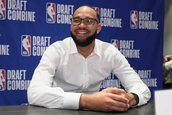FILE - Johni Broome smiles as he talks to media at the 2025 NBA basketball Draft Combine in Chicago, on May 14, 2025. (AP Photo/Nam Y. Huh, File)