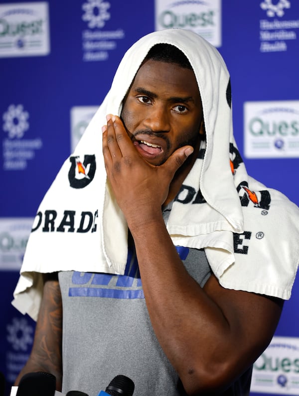 New York Giants linebacker Brian Burns talks to reporters after NFL football practice in East Rutherford, N.J., Thursday, June 5, 2025. (AP Photo/Noah K. Murray)