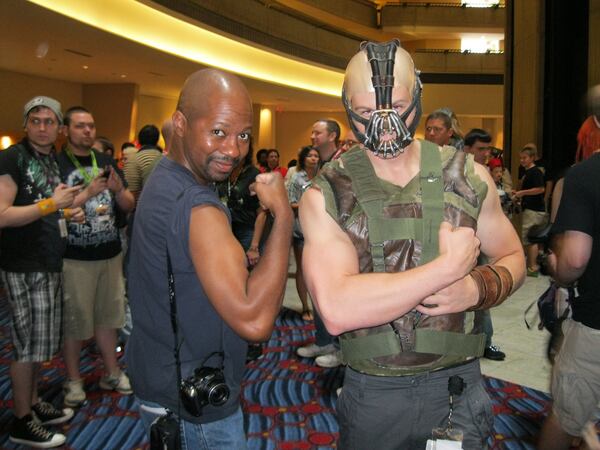 Channing Sherman (left), organizer of the Black Geeks of Dragon Con photo shoot, poses with a Bane cosplayer at Dragon Con 2012. COURTESY OF CHANNING SHERMAN