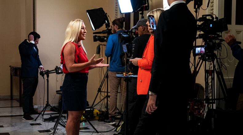 Rep. Marjorie Taylor Greene (R-Ga.) speaking to reporters after House Speaker Kevin McCarthy (R-Calif.) announced an impeachment inquiry into President Joe Biden in regard to his role in the business dealings of his son, Hunter Biden, on Capitol Hill in Washington on Tuesday, Sept. 12, 2023. McCarthy directed top congressional Republicans to open the impeachment inquiry into Biden, blowing past G.O.P. divisions as he worked to appease far-right lawmakers, including Greene, who are threatening to oust him amid a pitched fight over spending. (Haiyun Jiang/The New York Times)