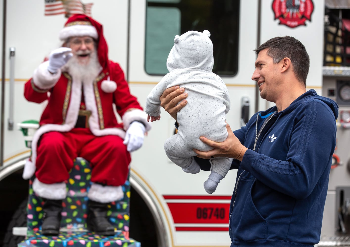 Santa near an Alpharetta Fire Truck