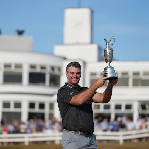 Ryan Fox of New Zealand poses with the Claret Jug trophy in front of the club house, after winning the British Open Golf championships at Royal Birkdale golf club, in Southport, England, Sunday, July 19, 2026. (AP Photo/Jon Super)