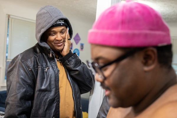 Friends, including drag mother Taylor Alxndr (left), gathered for Webb’s chest reveal in January. He chose to remove his nipples, which he says feels more in line with his nonbinary identity. “It was really beautiful,” says Alxndr of the experience. “I feel very fortunate to have witnessed it and been there.”