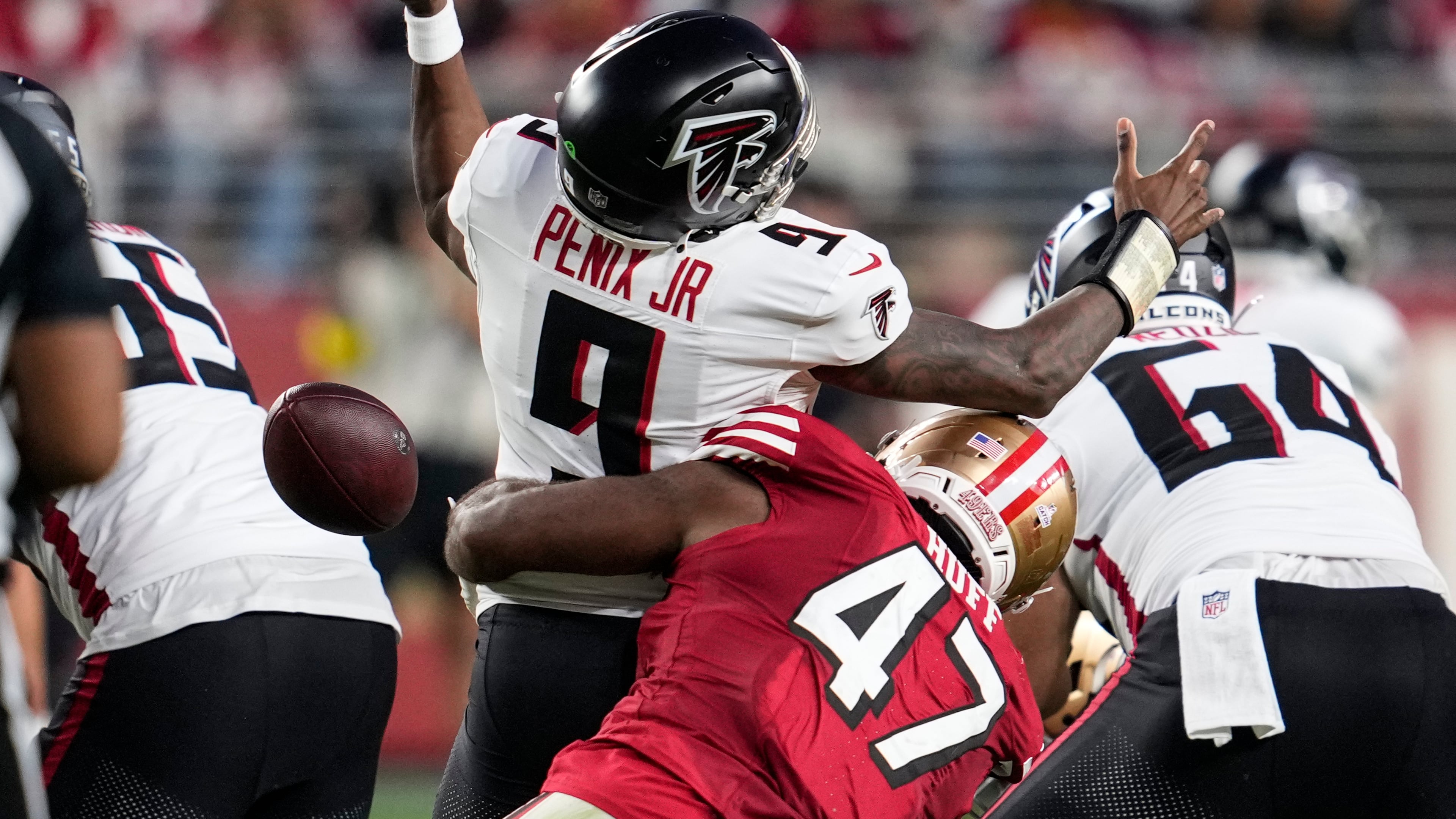 San Francisco 49ers defensive end Bryce Huff (47) forces a fumble against Atlanta Falcons quarterback Michael Penix Jr. (9) in the first half of an NFL football game, Sunday, Oct. 19, 2025, in Santa Clara, Calif. (AP Photo/Godofredo A. Vásquez)