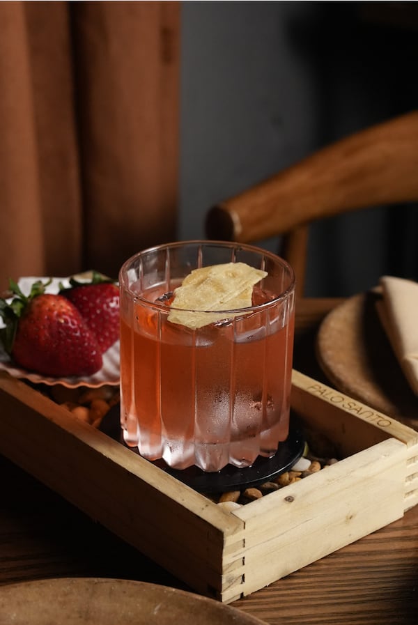 Meadow flavors of strawberry and fennel lift the bitter notes of Campari with vegetal sweetness in Palo Santo's Strawberry Fields Negroni. (Courtesy of Palo Santo)