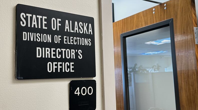 FILE - A sign indicates the director's office of the Alaska Division of Elections, March 19, 2026, in Juneau, Alaska. (AP Photo/Becky Bohrer, File)