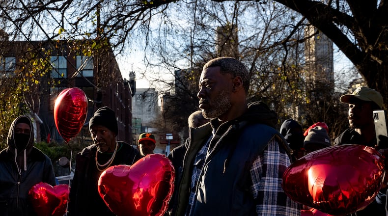 Community members gather to mourn the passing of a homeless man, who was killed during a city encampment clearing operation, on Friday, Jan. 17, 2025. (Ben Hendren for the AJC)