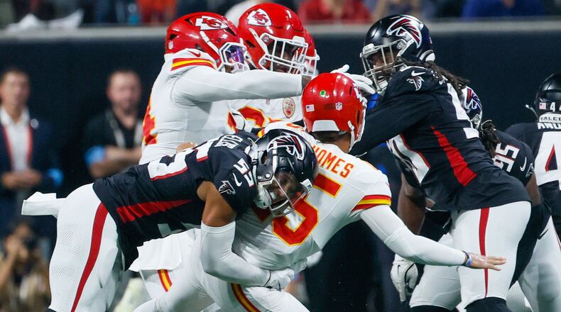 Atlanta Falcons linebacker Kaden Elliss (55) sacks Kansas City Chiefs quarterback Patrick Mahomes (15) as he throws for an interception during the first half on Sunday, Sept. 22, 2024, at Mercedes-Benz Stadium in Atlanta.
(Miguel Martinez/ AJC)