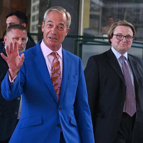 Britain's Reform UK leader Nigel Farage leaves Milbank Tower after he said he'll quit his Parliament seat and seek reelection in London, Tuesday, July 7, 2026.(AP Photo/Thomas Krych)