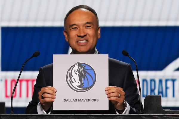 NBA Deputy Commissioner Mark Tatum announces that the Dallas Mavericks won the first pick in the NBA basketball draft lottery in Chicago, Monday, May 12, 2025. (AP Photo/Nam Y. Huh)