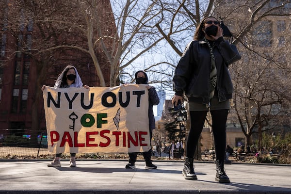 A protester including students of New York University gather for a demonstration in support of Palestinian activist Mahmoud Khalil at Washington Square Park, Tuesday, March 11, 2025, in New York. (AP Photo/Yuki Iwamura)
