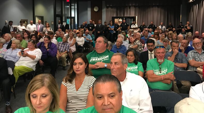 more than a hundred Cobb residents turned out for the county commission vote on the millage rate (Meris Lutz/AJC)