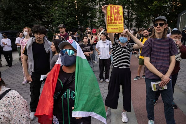A demonstrator with carrying a Mexican flag chants during a protest against deportation by Immigration and Customs Enforcement in New York, Wednesday, June 11, 2025. (AP Photo/Yuki Iwamura)