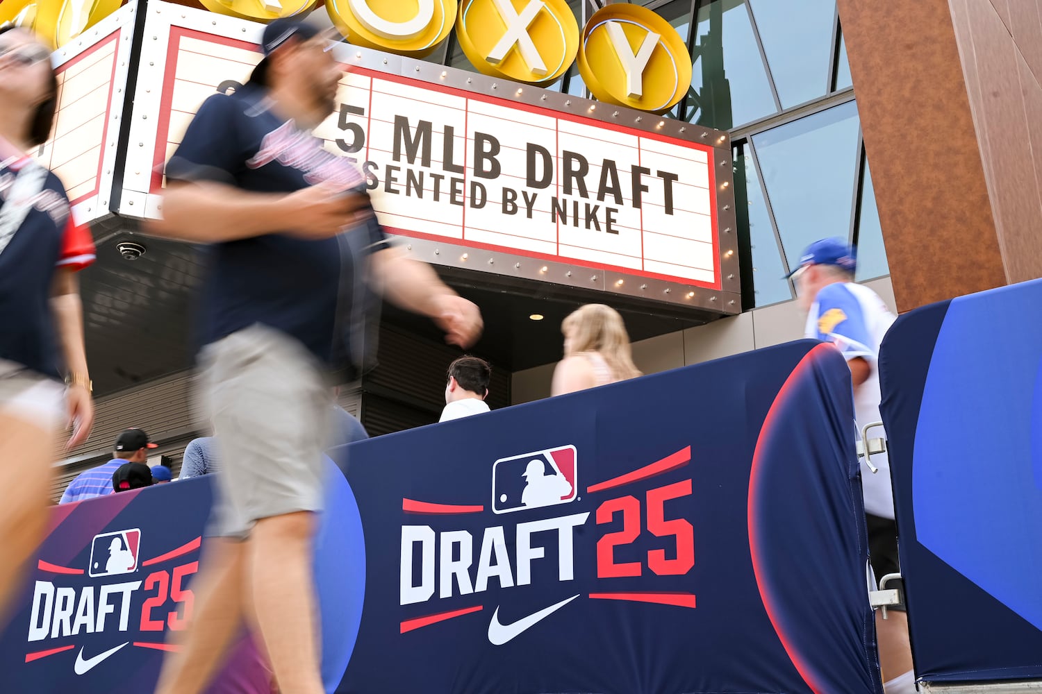 Attendees stand in line during the 2025 MLB Draft Sunday, July 13, 2025 at the Coca-Cola Roxy in Atlanta. (Daniel Varnado/For the Atlanta Journal-Constitution)