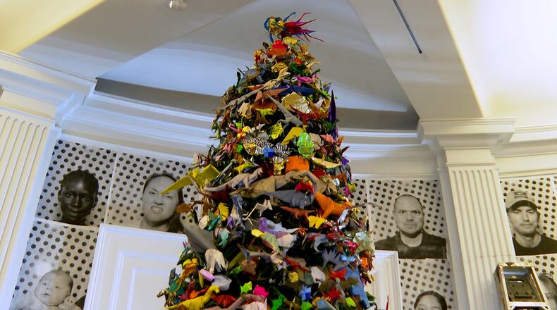 The Origami Holiday Tree stands at the American Museum of Natural History, Thursday, Nov. 13, 2025, in New York. (AP Photo/Joe Frederick)