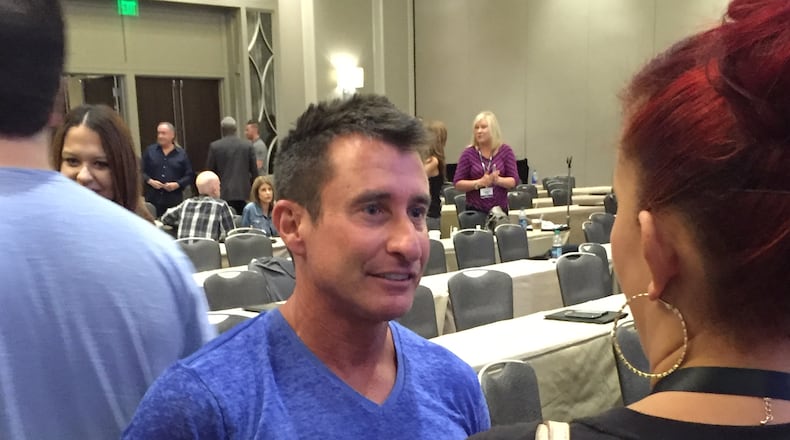 Bert Weiss at Don Anthony's Morning Show Boot Camp for radio personalities after he was part of a panel called "Masters of the Morning." Here he is talking to Power 96.1 host Riley Couture. CREDIT: Rodney Ho/ rho@ajc.com