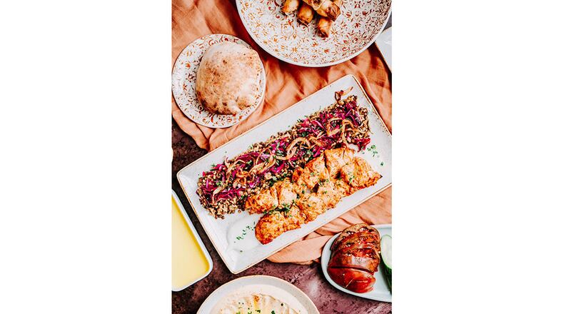 The menu for Raik Mediterranean Kitchen includes flatbreads, sides and main dishes including filet mignon kabob and a falafel plate. / Courtesy of Raik Mediterranean Kitchen