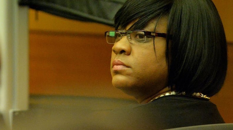 Former SRT Director Tamara Cotman listens to testimony in court Thursday morning. KENT D. JOHNSON / KDJOHNSON@AJC.COM