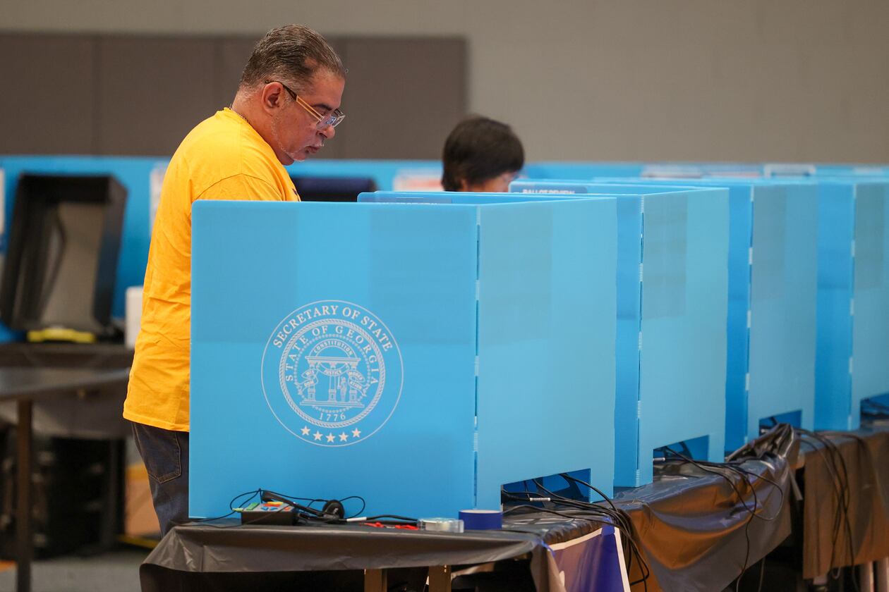 Voters cast their ballots at Lucky Shoals Park Community Recreation Center Tuesday, Nov. 8, 2022, in Norcross. PHIL SKINNER FOR THE ATLANTA JOURNAL-CONSTITUTION
