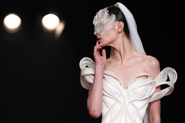 A model wears a creation as part of the Iris van Herpen Fall-Winter 2025/26 Haute Couture collection presented Monday, July 7, 2025, in Paris. (AP Photo/Tom Nicholson)
