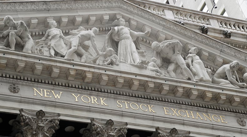 Wall Street extended its recent run of gains Tuesday, despite a late stumble that nearly wiped out the stock market's gains for the day. (AP Photo/Frank Franklin II)