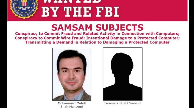 Faramarz Shahi Savandi, 34, and Mohammad Mehdi Shah Mansouri, 27, are wanted by the FBI.