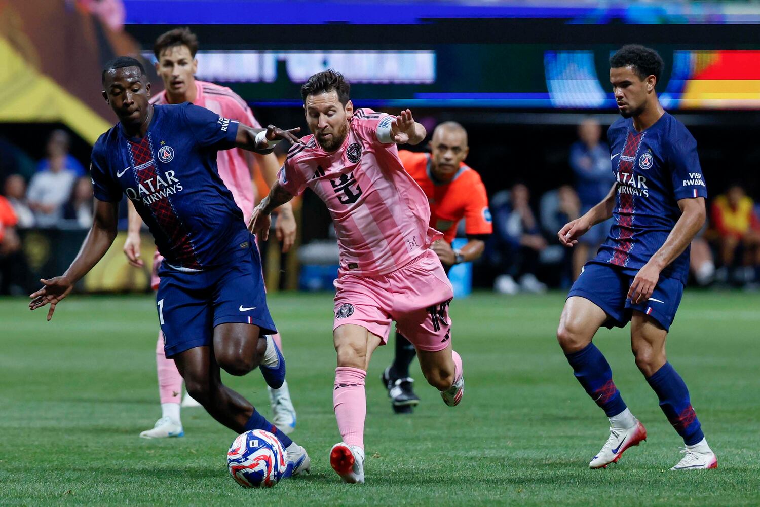 Inter Miami forward Lionel Messi (10) drbbles between PSG defenders during the Club World Cup round of 16 soccer match between Paris Saint-Germain FC and Inter Miami in Atlanta, Georgia, on Sunday, June 29, 2025.
(Miguel Martinez/ AJC)